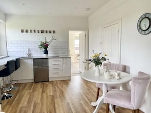 Hazelwood's lovely sunny dining room/ kitchen