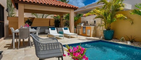 Our backyard tropical oasis with private pool, BBQ, dining & lounging areas