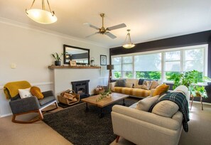 Cosy living space with open fireplace