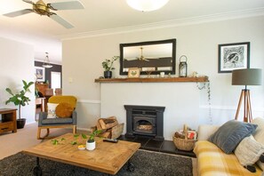 Cosy living space with open fireplace