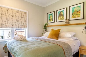 Master bedroom with comfortable queen size bed