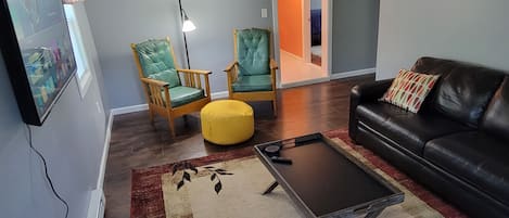 Living room with couch and 2 chairs