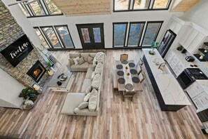 Elevate your stay with stunning high ceilings and a chic open-plan living area – a luxe space to unwind and entertain!