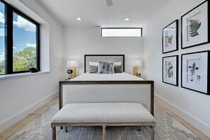 Primary bedroom beautifully decorated with queen bed