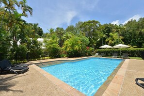 Dive into pure bliss! The refreshing shared pool is the ideal spot to soak up the sun and create cherished memories with loved ones.