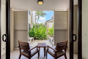 Bask in the sunshine on the balcony with two chairs, the perfect spot to savour the outdoors.