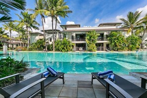 Lounge by the shared pool and make the most of the sunloungers for a relaxing time.