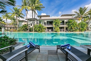 Lounge by the shared pool and make the most of the sunloungers for a relaxing time.