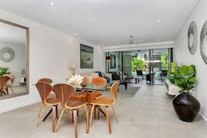 Gather around the dining area and enjoy meals together in a warm and inviting atmosphere.