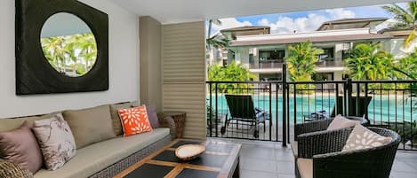 Enjoy engaging conversations and soak in the pool views from the comfort of the balcony.