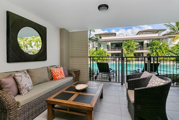 Enjoy engaging conversations and soak in the pool views from the comfort of the balcony.