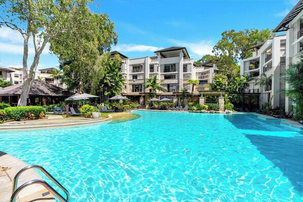 Dive into relaxation and refreshment in the inviting pool.