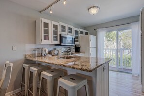 Kitchen | Breakfast Bar | Slider to Deck