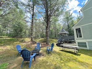 Private yard with firepit, new grill and several decked sitting areas