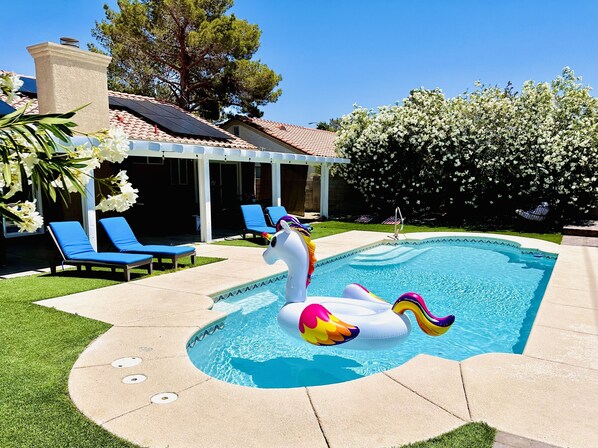 Pool, backyard with relaxing seating area and amazing Luxury Spa