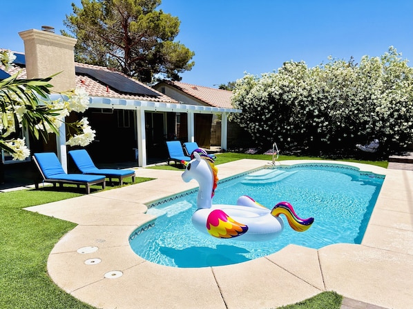 Pool, backyard with relaxing seating area and amazing Luxury Spa