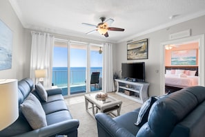 Gulf View Living Area with Balcony Access & Flat Screen TV