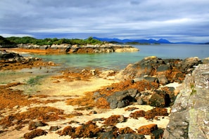The Coral Beach, Plockton.
Isle of Skye in background.