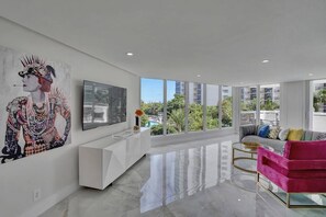 Living area, Roku streaming tv, water views of Biscayne Bay and pool