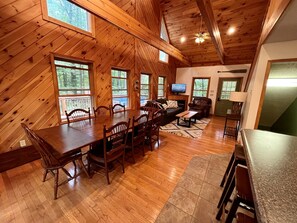 Dining area with large table and plenty of seating!