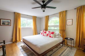 At the top of the stairs, we have our main bedroom on the 2nd floor. With great light during the day and black out blinds for sleeping at night.