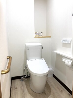 Toilet with washing machine