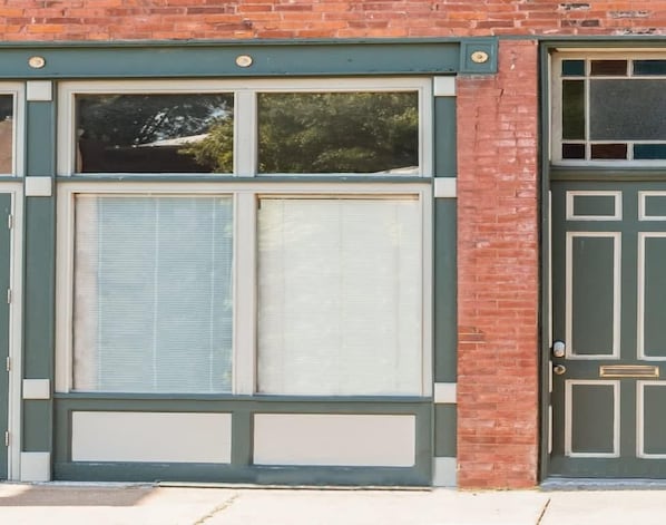 Your wonderful ABODE awaits, in this charming storefront apartment