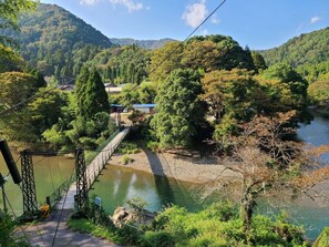 Ayu is seen from the thin Takatoki River