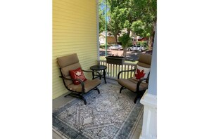 Enjoy a morning coffee or afternoon glass of wine on the front porch