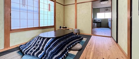 Living room (with kotatsu and stove in winter)