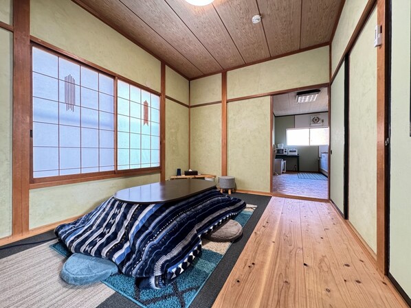 Living room (with kotatsu and stove in winter)