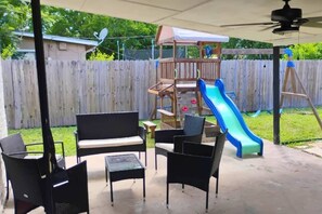 Discover the NEW kids' playground with slides, climbing structures, and swings. 