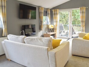 Living area | Devin Lodge, Dollar