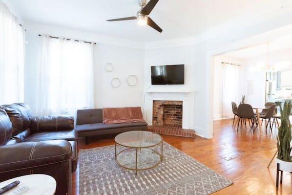 One of three living rooms, this one features a sleeper sofa