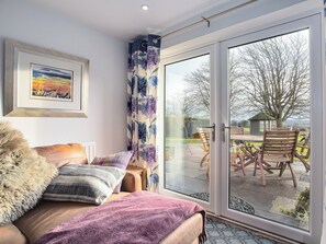 French doors leading to the patio | Fieldview - Blinkbonny Cottages, Auchtermuchty