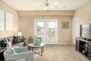A spacious living area with plenty of seating.