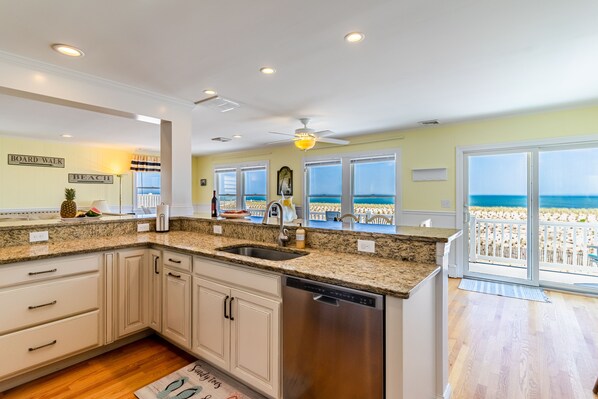 Modern kitchen with all necessities. Open concept with ocean views!