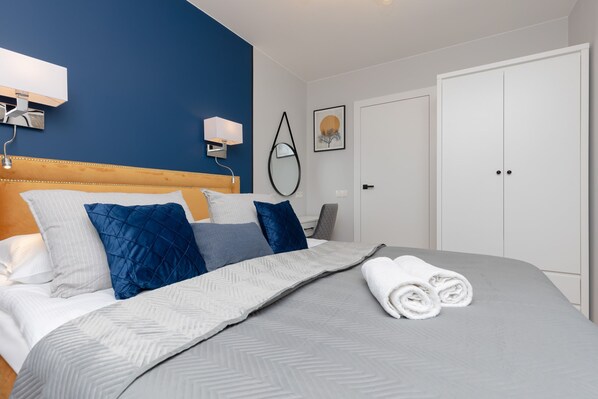 Comfortable double bed in the bedroom. 