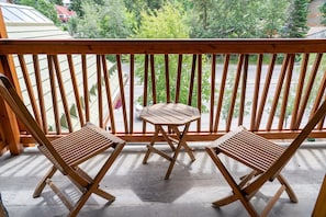 Enjoy a glass of wine on your spacious, private balcony while appreciating the alpenglow on the mountains.