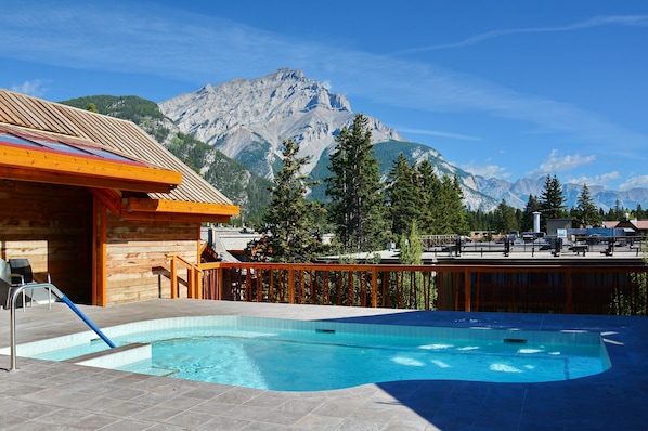 Soak in the shared outdoor hot tub!