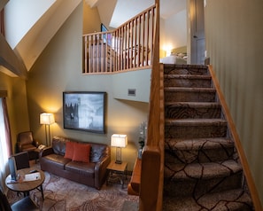 Return to this stunning sitting area with flatscreen TV and enjoy a glass of wine.