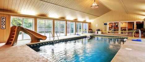 Indoor heated salt water pool with heated water slide