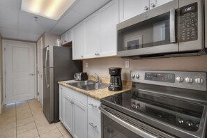 An updated kitchen makes preparing meals a breeze.