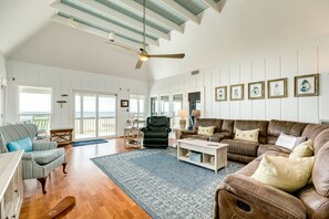 Bright and airy living area with wall of windows