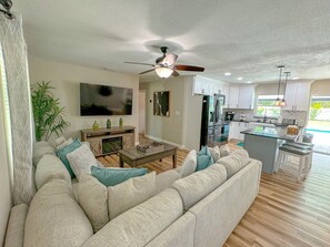 Large sectional sofa with a 65in smart tv