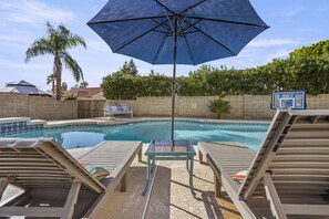 Chaise loungers poolside 