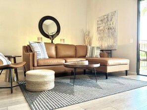 LIVING ROOM - perfect for resting and entertaining, direct access to front patio
