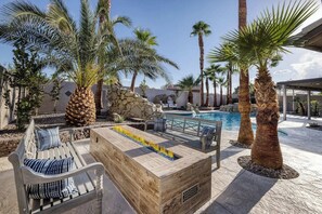 Custom 10 foot firepit in the garden oasis.