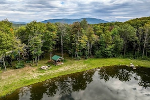 Lake and Forest Views | Private Covered Hot Tub | Fire Pit