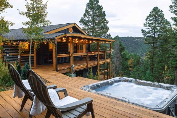 Take a soak in the hot tub as you revel in the serenity of the mountains or lounge on the sun deck or the covered porch with your favorite book.